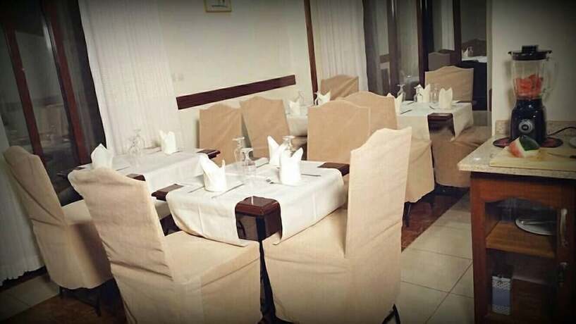 Imagen del bar/restaurante del Hotel World House Gisozi. Foto 2