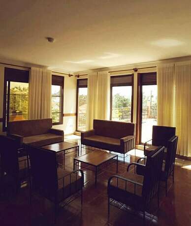 Imagen del bar/restaurante del Hotel World House Gisozi. Foto 9