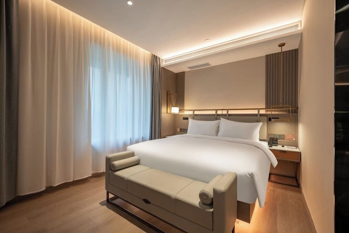 Imagen de la habitación del Hotel World (Jinan CBD Dingjiazhuang Subway Station). Foto 2