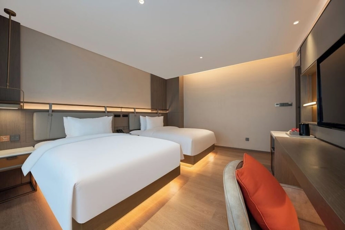 Imagen de la habitación del Hotel World (Jinan CBD Dingjiazhuang Subway Station). Foto 4