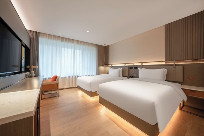 Imagen de la habitación del Hotel World (Jinan CBD Dingjiazhuang Subway Station). Foto 6