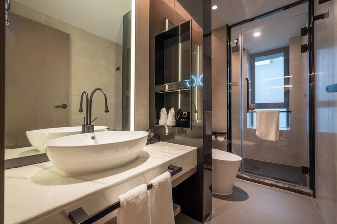 Imagen de la habitación del Hotel World (Jinan CBD Dingjiazhuang Subway Station). Foto 7