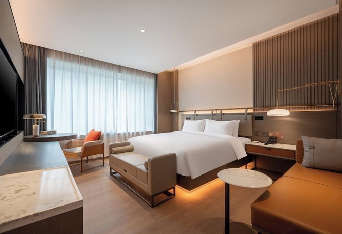 Imagen de la habitación del Hotel World (Jinan CBD Dingjiazhuang Subway Station). Foto 8