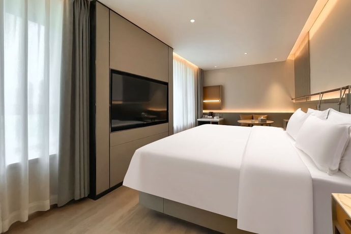 Imagen de la habitación del Hotel World (Jinan CBD Dingjiazhuang Subway Station). Foto 10