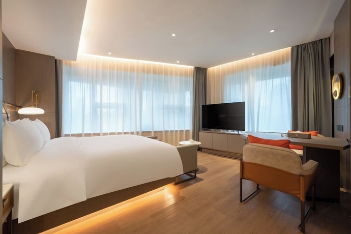 Imagen de la habitación del Hotel World (Jinan CBD Dingjiazhuang Subway Station). Foto 13