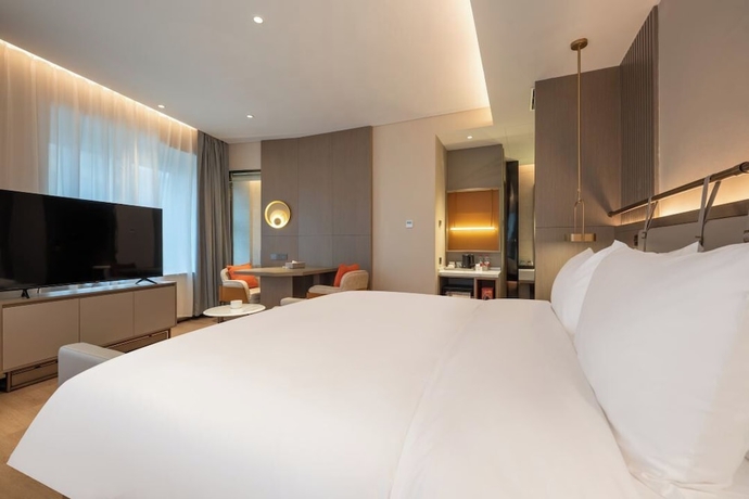 Imagen de la habitación del Hotel World (Jinan CBD Dingjiazhuang Subway Station). Foto 15