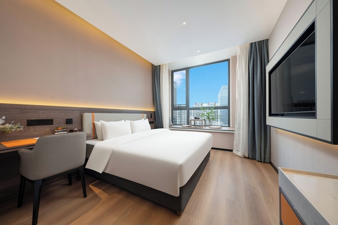 Imagen de la habitación del Hotel World Jinan CBD MixC Branch. Foto 3