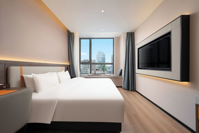 Imagen de la habitación del Hotel World Jinan CBD MixC Branch. Foto 4