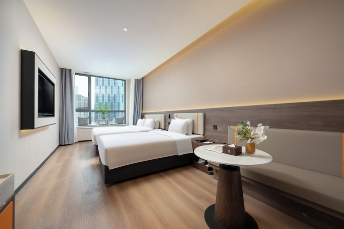Imagen de la habitación del Hotel World Jinan CBD MixC Branch. Foto 5