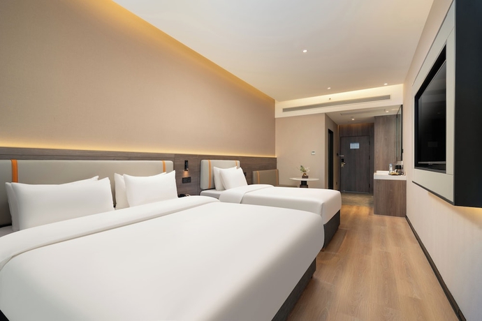 Imagen de la habitación del Hotel World Jinan CBD MixC Branch. Foto 6