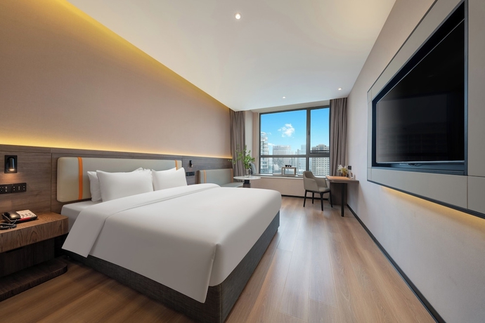 Imagen de la habitación del Hotel World Jinan CBD MixC Branch. Foto 7