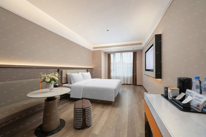 Imagen de la habitación del Hotel World Jinan Fengming Road. Foto 2