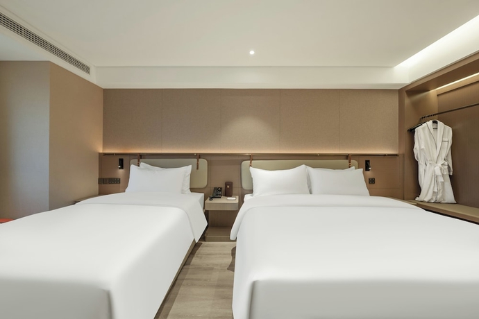 Imagen de la habitación del Hotel World Jinan Wenlvcheng Branch. Foto 2