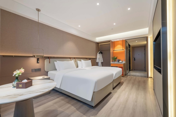 Imagen de la habitación del Hotel World Jinan Wenlvcheng Branch. Foto 3