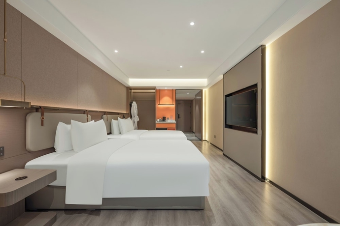 Imagen de la habitación del Hotel World Jinan Wenlvcheng Branch. Foto 7