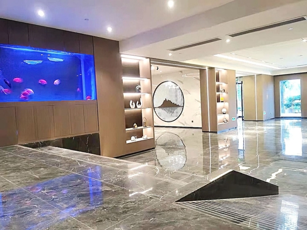Imagen de los interiores del Hotel World Jinan Wenlvcheng Branch. Foto 12