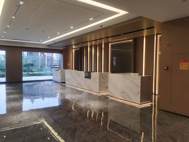 Imagen de los interiores del Hotel World Jinan Wenlvcheng Branch. Foto 13