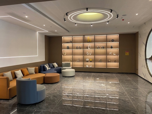 Imagen de los interiores del Hotel World Jinan Wenlvcheng Branch. Foto 15