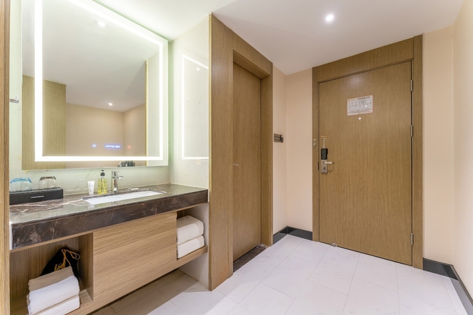 Imagen de la habitación del Hotel World Olympic Sports Center Branch. Foto 12