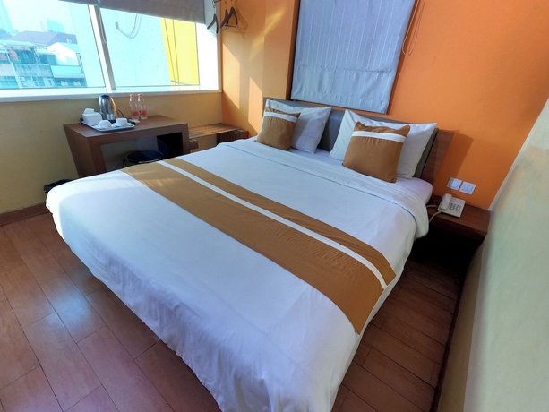 Imagen de la habitación del Hotel World, Pekojan. Foto 2
