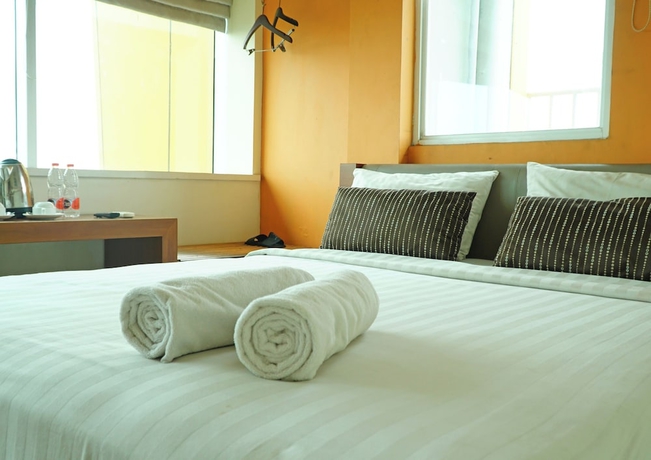 Imagen de la habitación del Hotel World, Pekojan. Foto 3