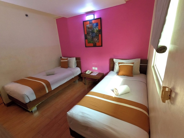 Imagen de la habitación del Hotel World, Pekojan. Foto 4