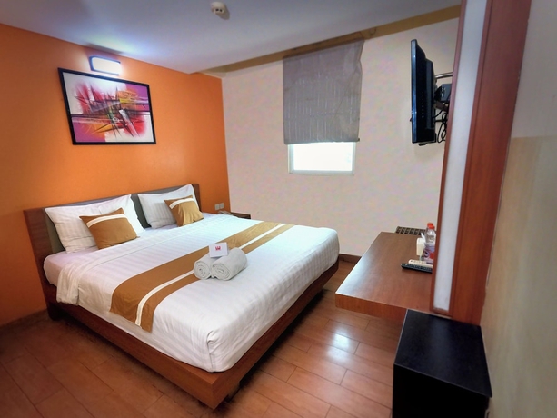 Imagen de la habitación del Hotel World, Pekojan. Foto 6