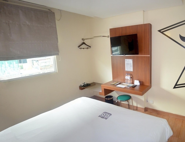 Imagen de la habitación del Hotel World, Pekojan. Foto 7