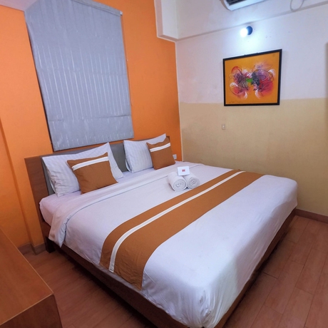 Imagen de la habitación del Hotel World, Pekojan. Foto 10