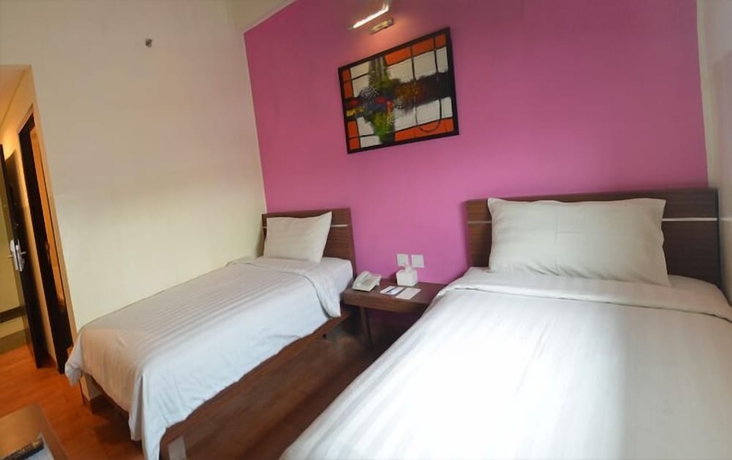 Imagen de la habitación del Hotel World, Pekojan. Foto 13