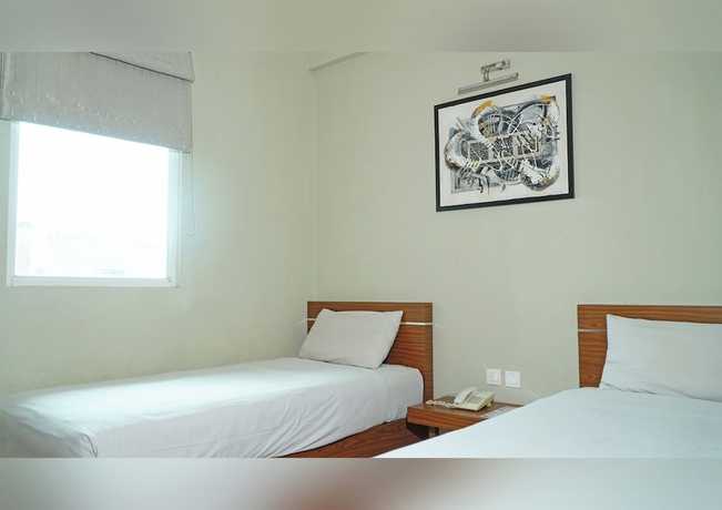 Imagen de la habitación del Hotel World, Pekojan. Foto 14