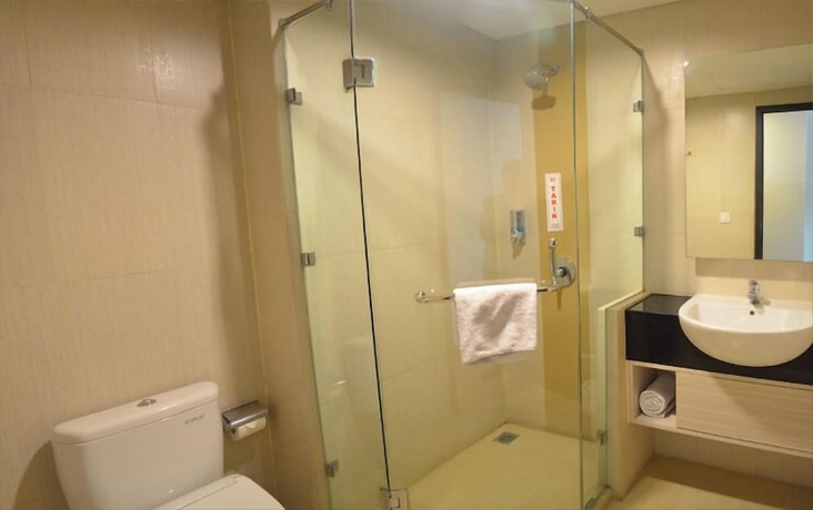 Imagen de la habitación del Hotel World, Pekojan. Foto 16