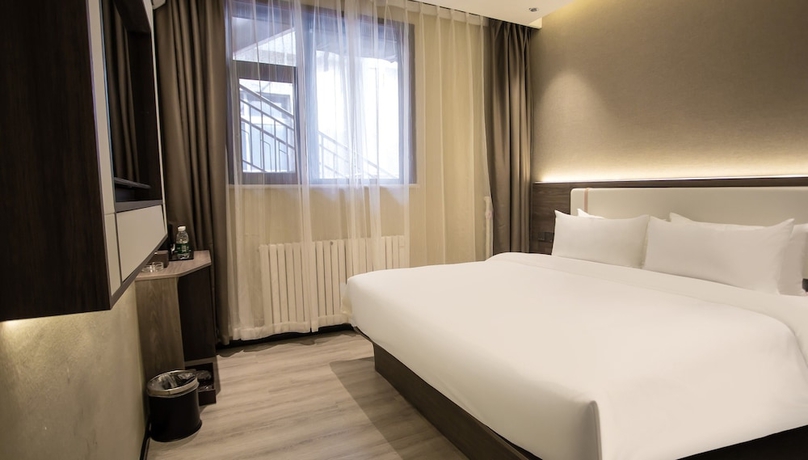 Imagen de la habitación del Hotel World Smart Dezhou Railway Station. Foto 9