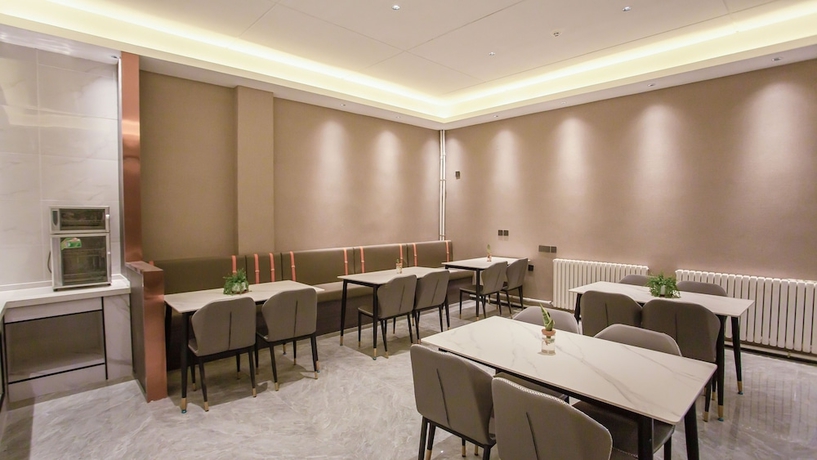 Imagen del bar/restaurante del Hotel World Smart Dezhou Railway Station. Foto 4