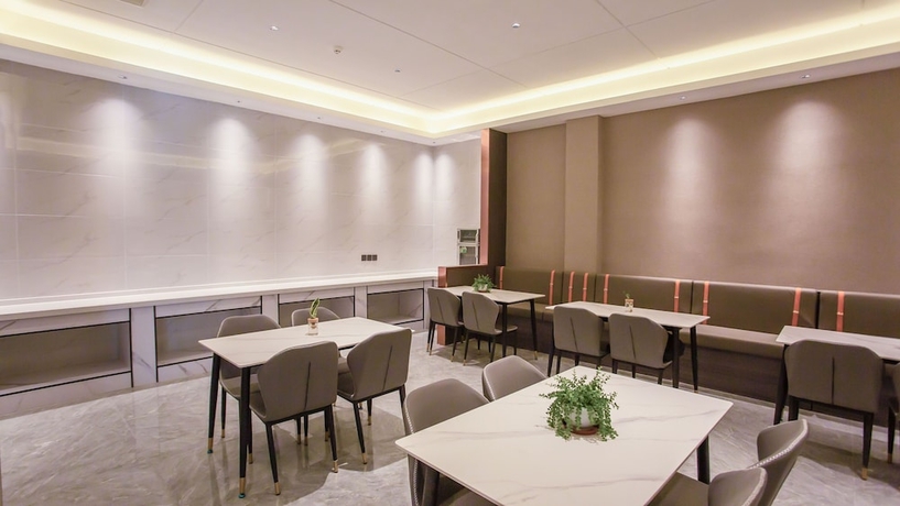Imagen del bar/restaurante del Hotel World Smart Dezhou Railway Station. Foto 5