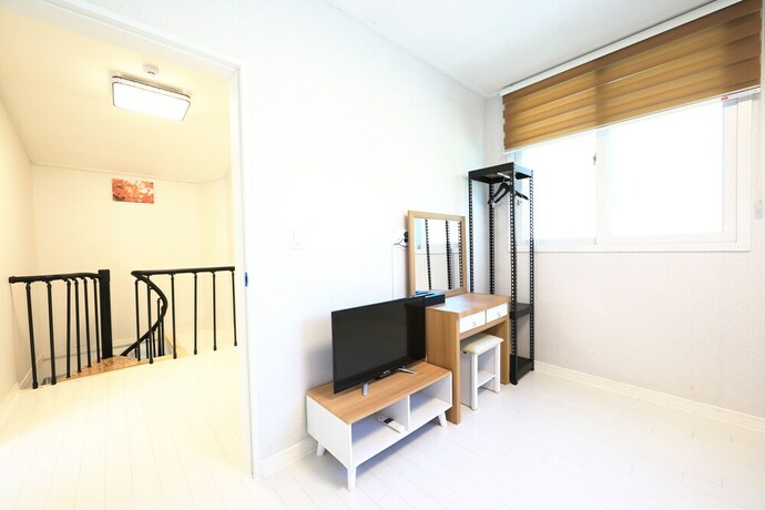 Imagen de la habitación del Hotel World Village Poolvilla. Foto 30