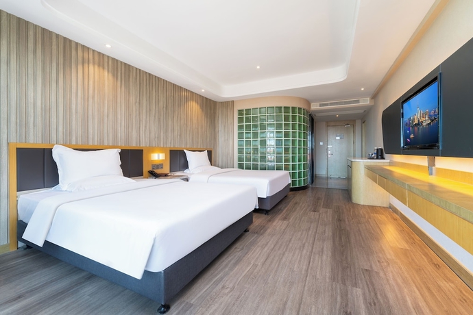 Imagen de la habitación del Hotel World Weihai Bathing Beach. Foto 5