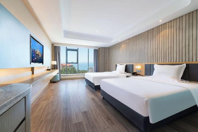 Imagen de la habitación del Hotel World Weihai Bathing Beach. Foto 6