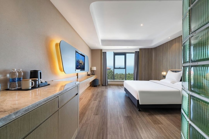 Imagen de la habitación del Hotel World Weihai Bathing Beach. Foto 8