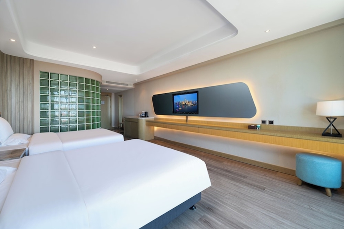 Imagen de la habitación del Hotel World Weihai Bathing Beach. Foto 9