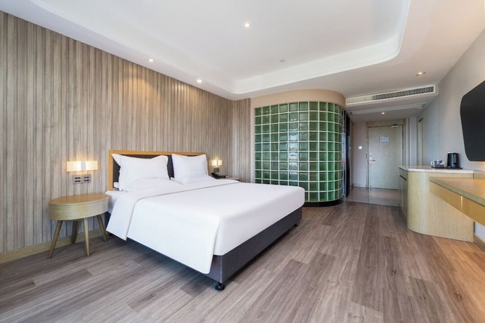 Imagen de la habitación del Hotel World Weihai Bathing Beach. Foto 11