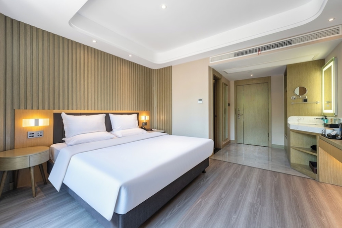 Imagen de la habitación del Hotel World Weihai Bathing Beach. Foto 12