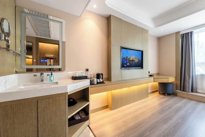 Imagen de la habitación del Hotel World Weihai Bathing Beach. Foto 13