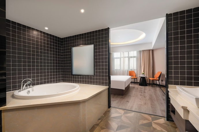 Imagen de la habitación del Hotel World Zhengzhou Univ Hi-tec Branch. Foto 2
