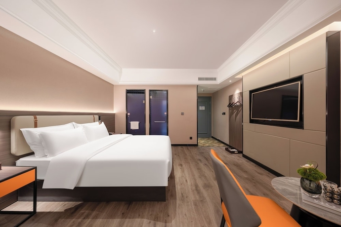 Imagen de la habitación del Hotel World Zhengzhou Univ Hi-tec Branch. Foto 11