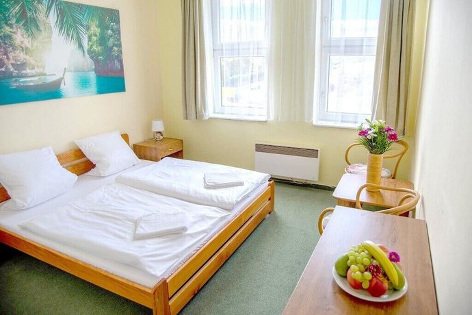 Imagen de la habitación del Hotel World of Harmony. Foto 2