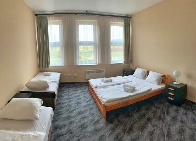 Imagen de la habitación del Hotel World of Harmony. Foto 4