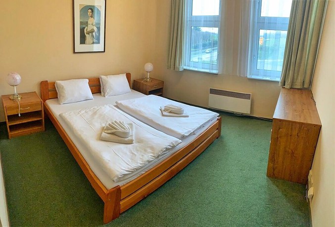 Imagen de la habitación del Hotel World of Harmony. Foto 9
