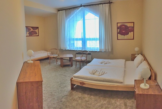 Imagen de la habitación del Hotel World of Harmony. Foto 10
