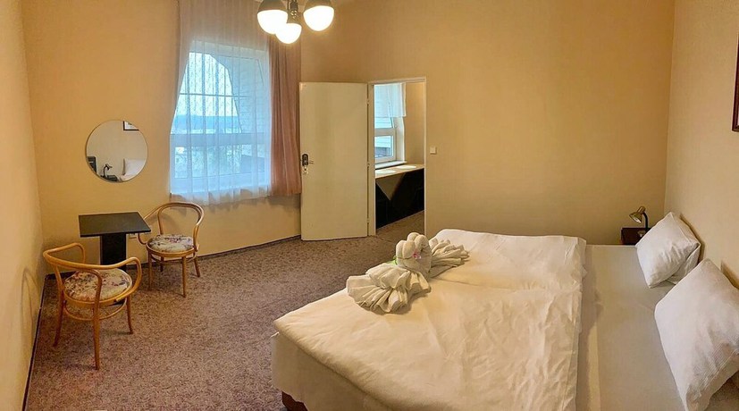 Imagen de la habitación del Hotel World of Harmony. Foto 12